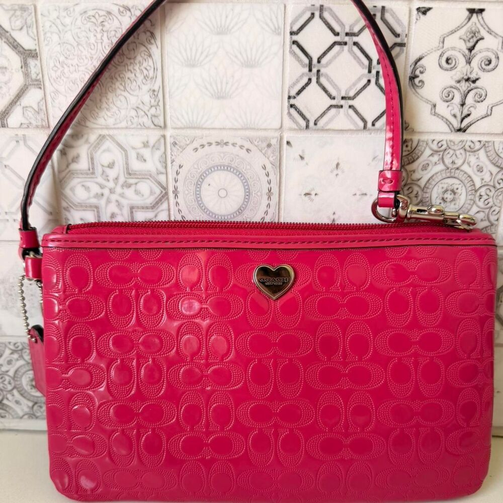 Coach pink signature wristlet